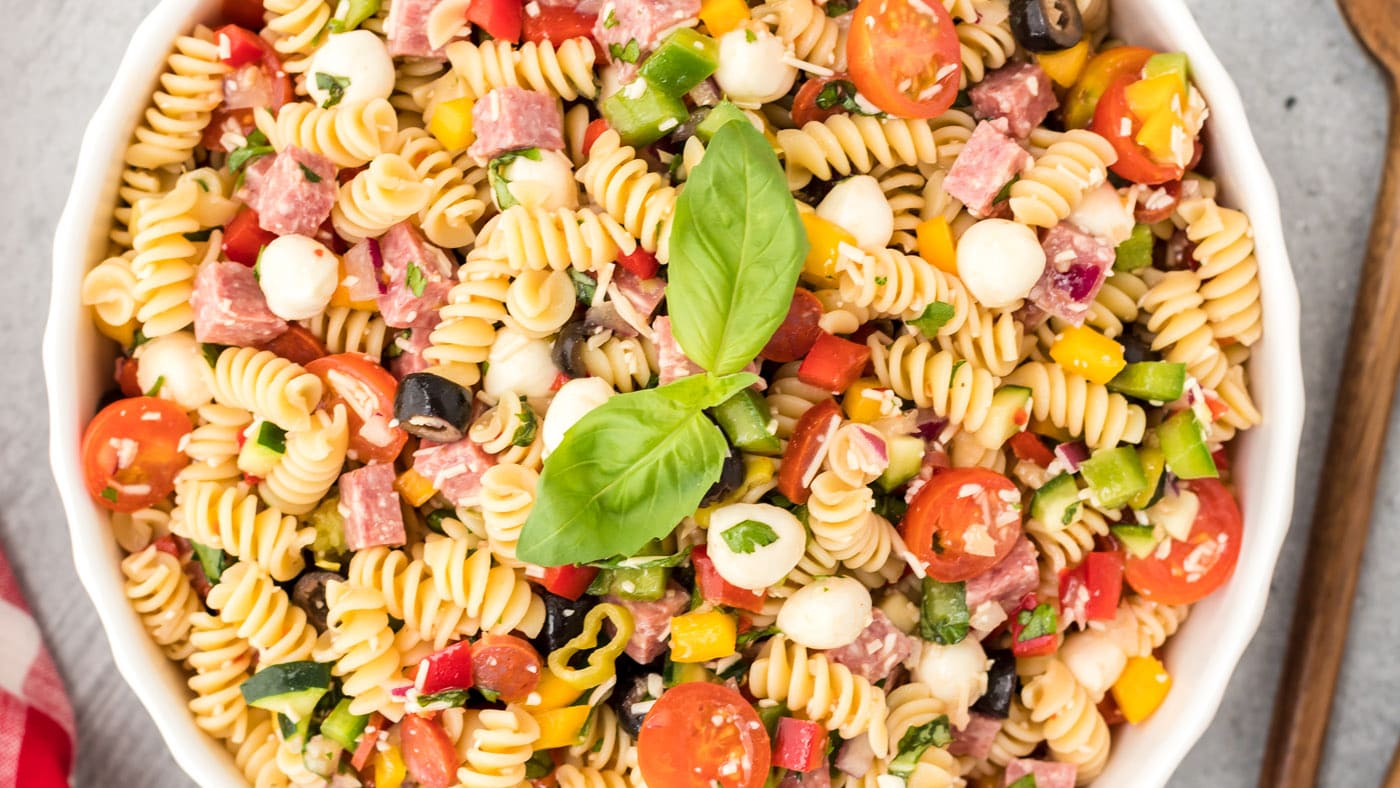 Italian pasta salad hits all the right spots with an array of colorful vegetables for crunch and tex