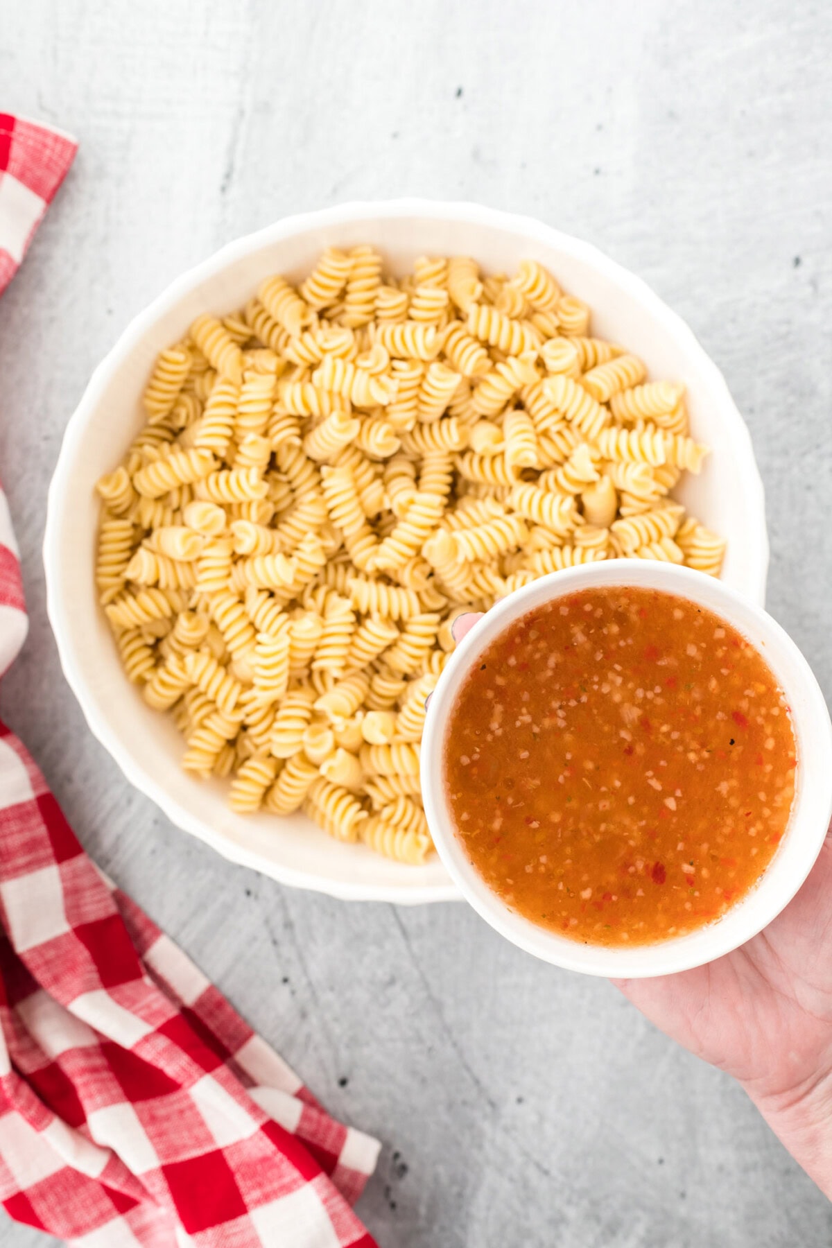 Italian dressing over pasta noodles