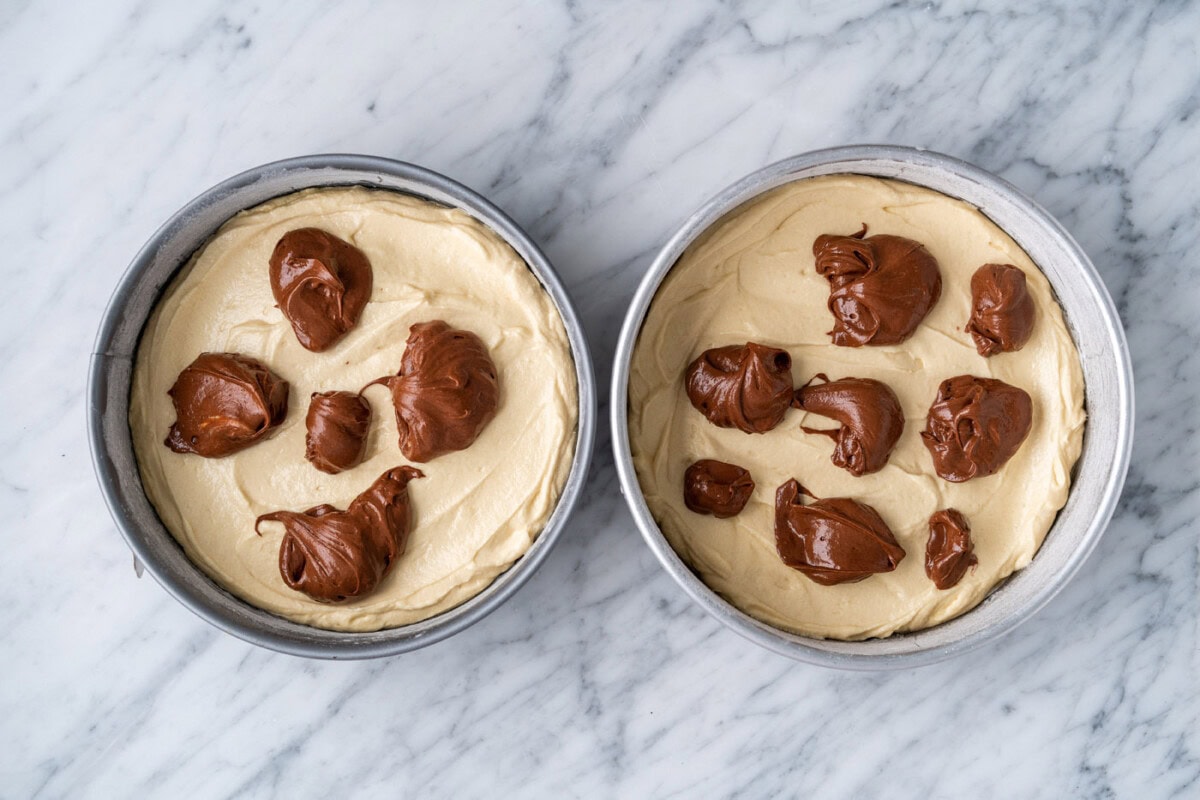 yellow cake batter with chocolate cake batter on top
