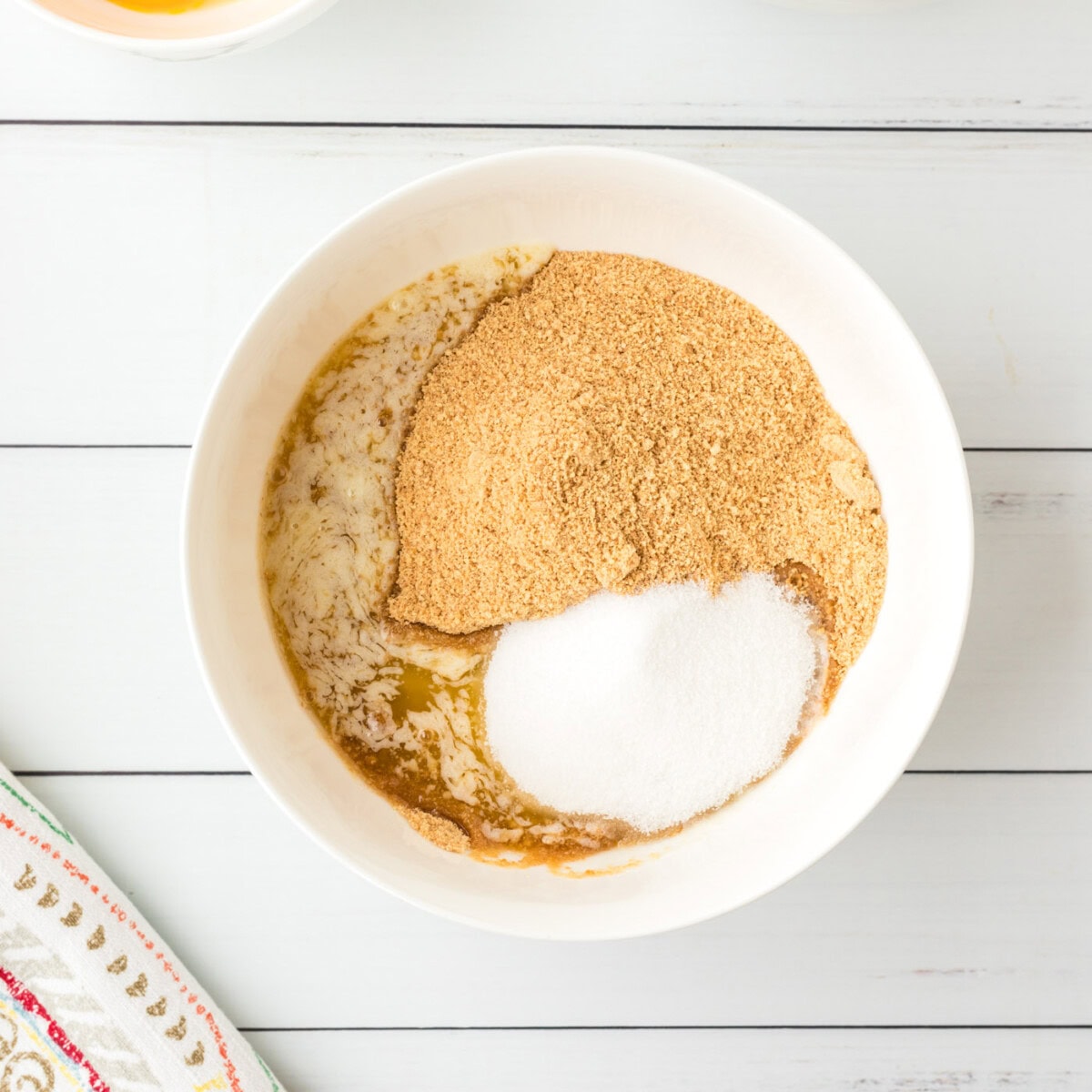 crust ingredients in a bowl for mini pies