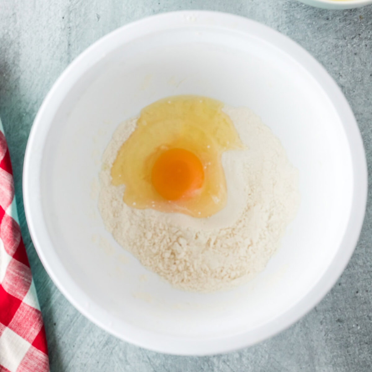 egg and milk mixed with flour and baking powder