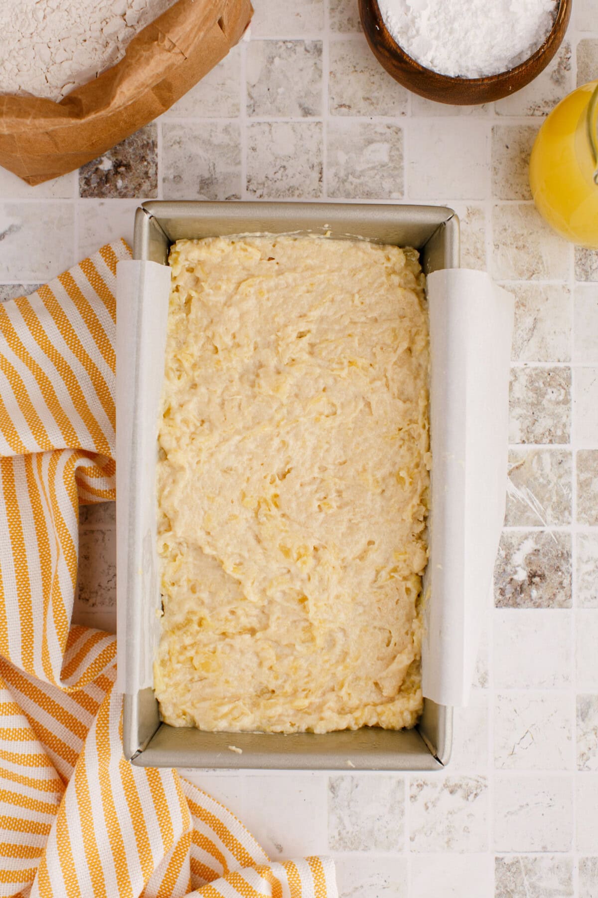 pineapple quick bread in a loaf pan