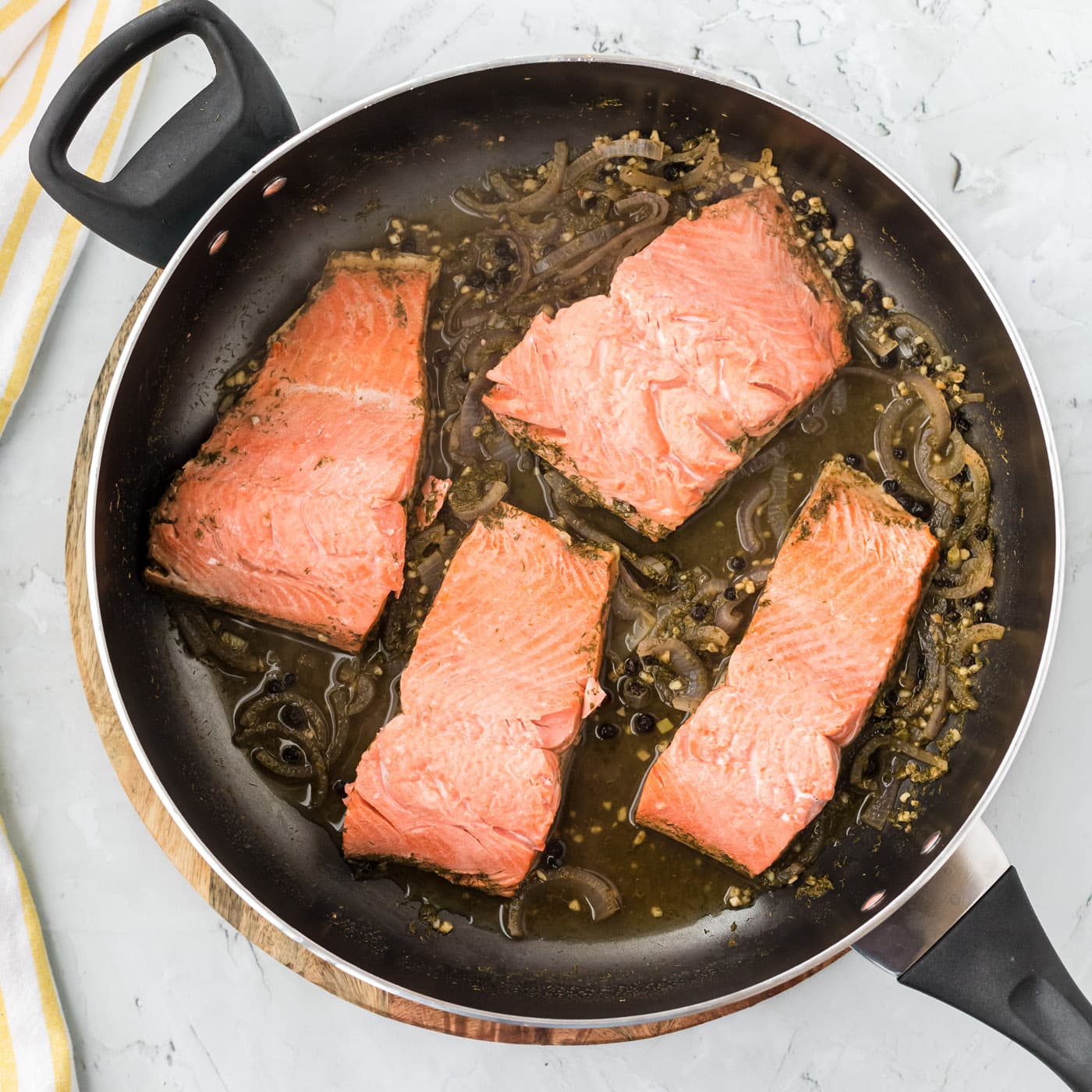 poached salmon in a skillet