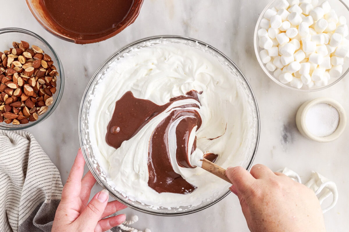 folding chocolate mixture into whipped cream
