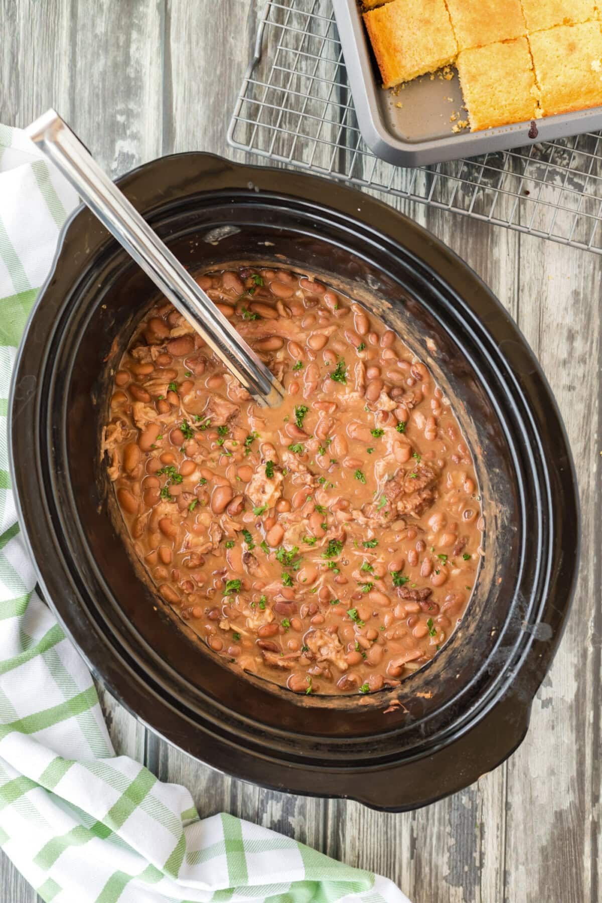 Slow Cooker Pinto Beans with ladle