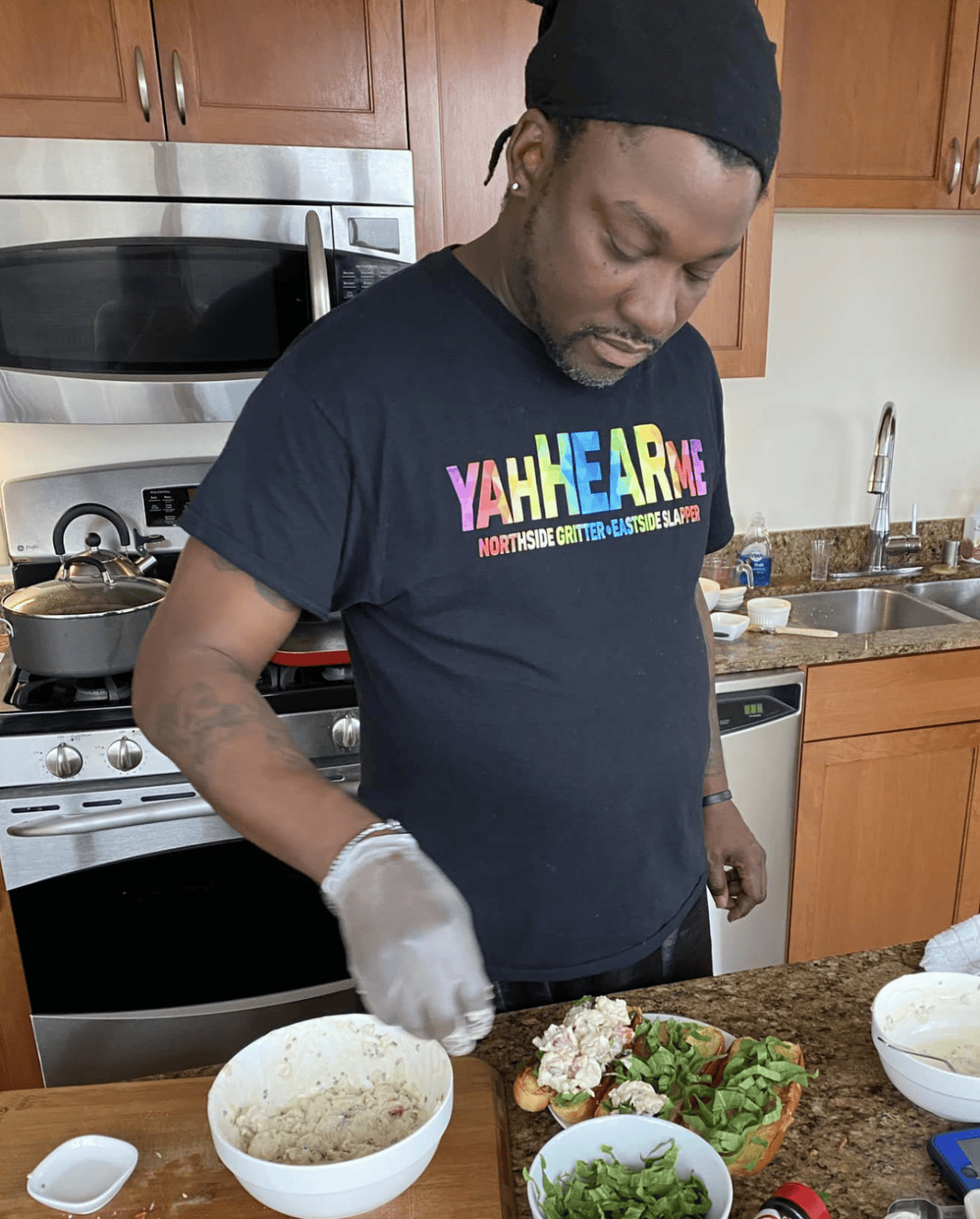 chef antoine making dressing for lobster roll