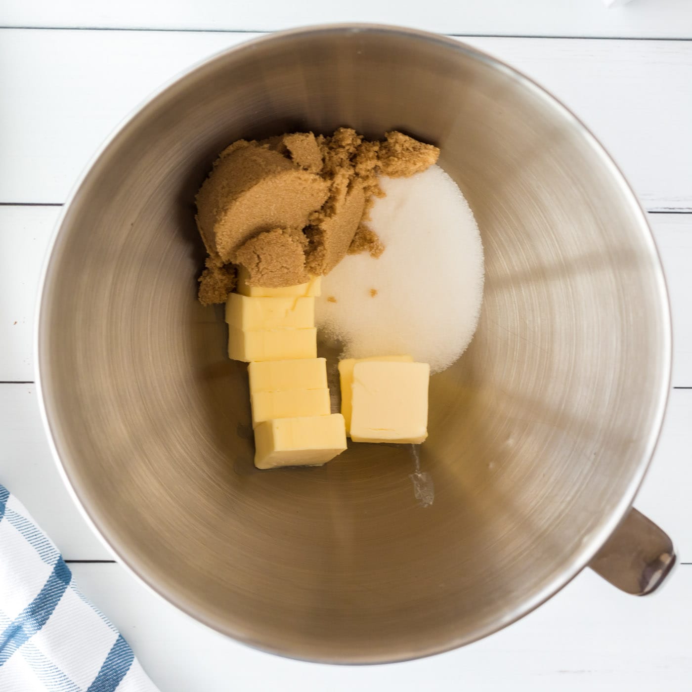 butter and sugars in a mixing bowl
