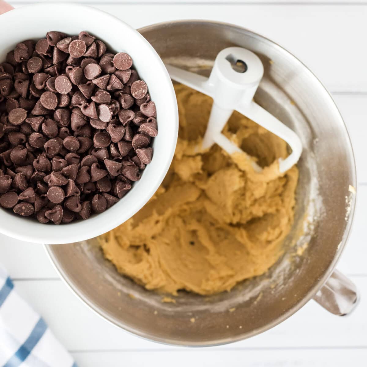 chocolate chips over the top of cookie dough
