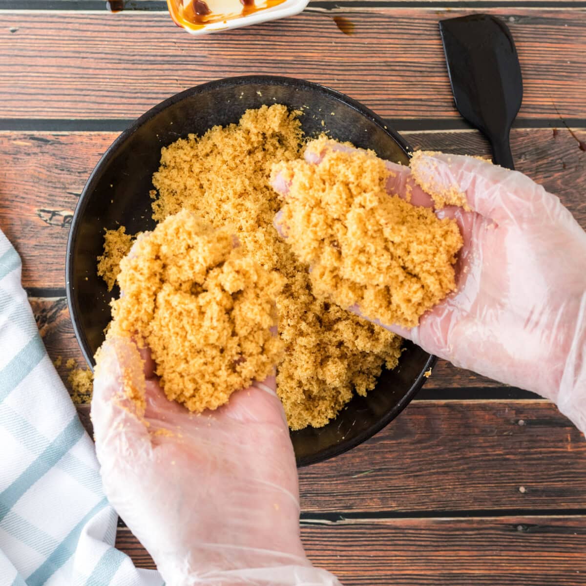 hands holding brown sugar