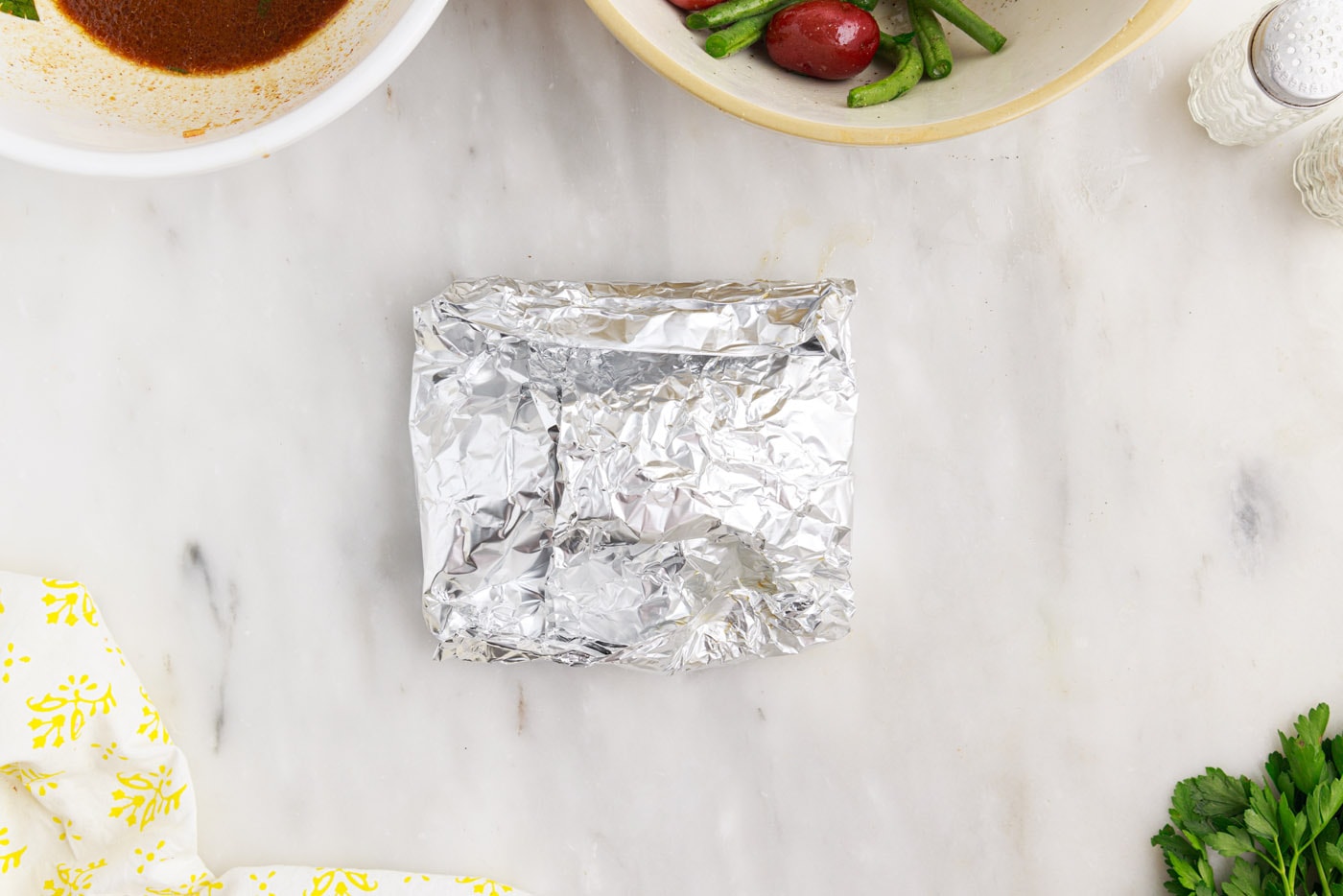 folded up chicken campfire foil packets