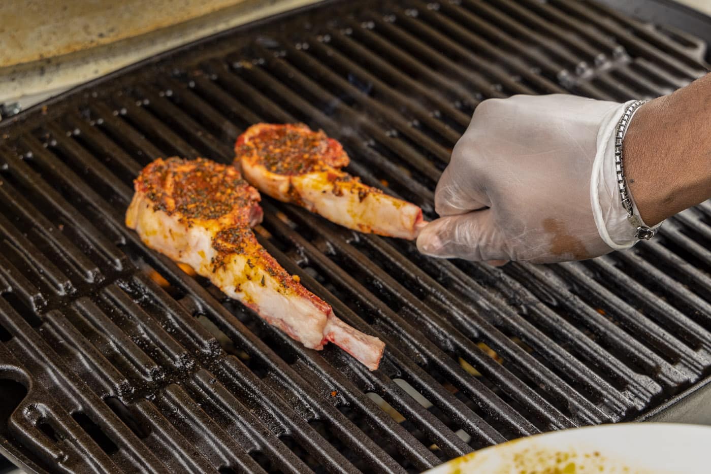 placing lamb loin chops on grill