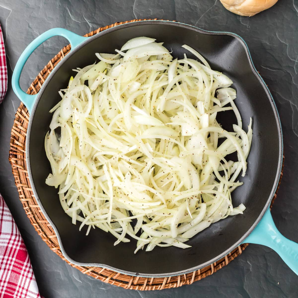 sliced onions in a skillet