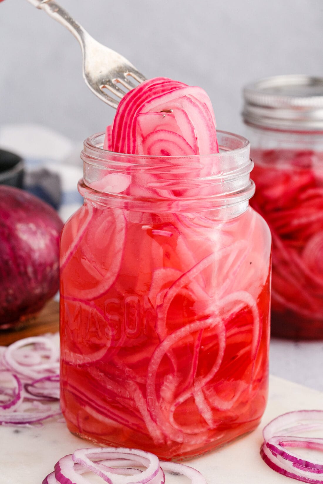 lifting Pickled Onions with a fork