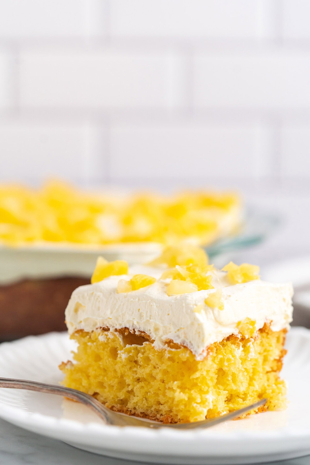 Pineapple Sunshine Cake on a plate