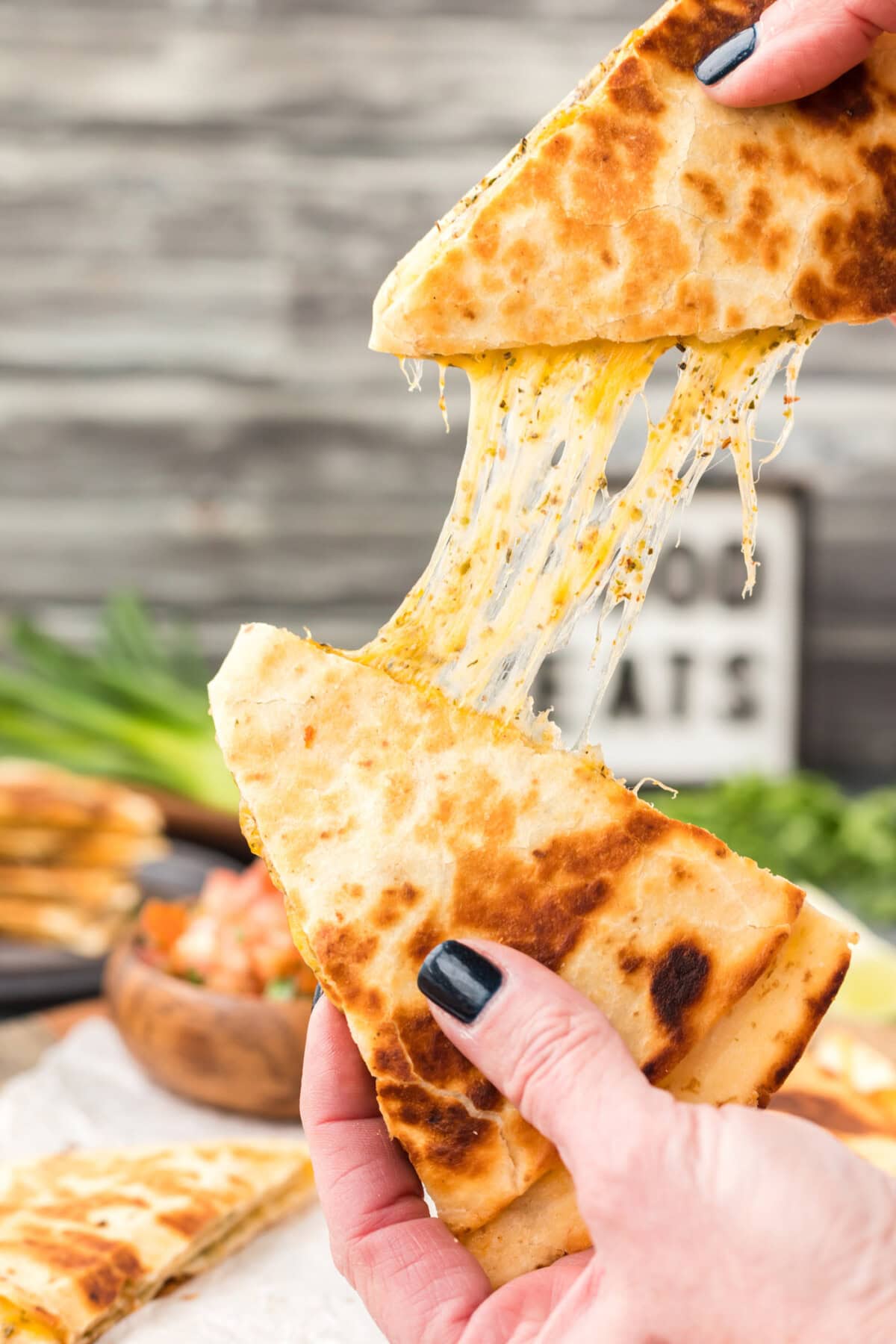 stretching a cheesy Quesadilla