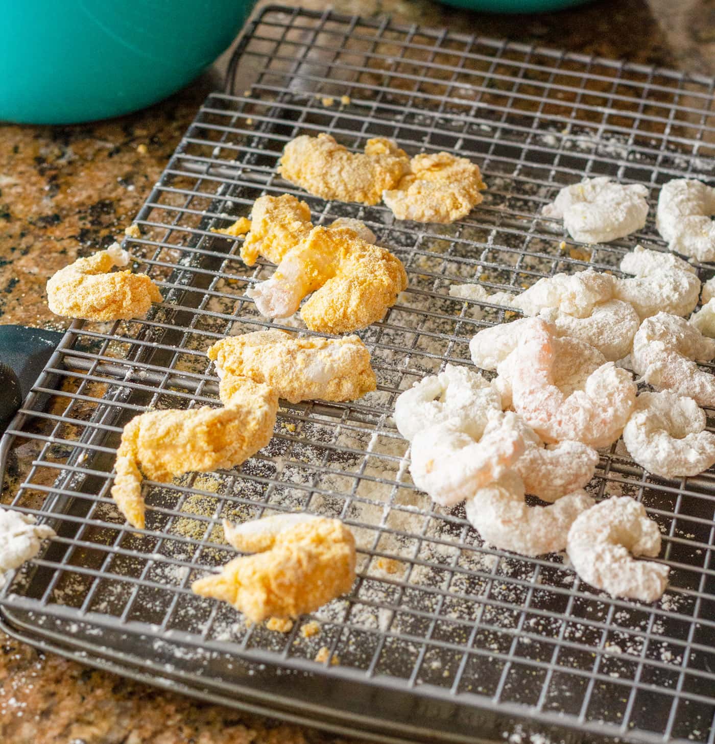 breaded shrimp on a wire cooling rack