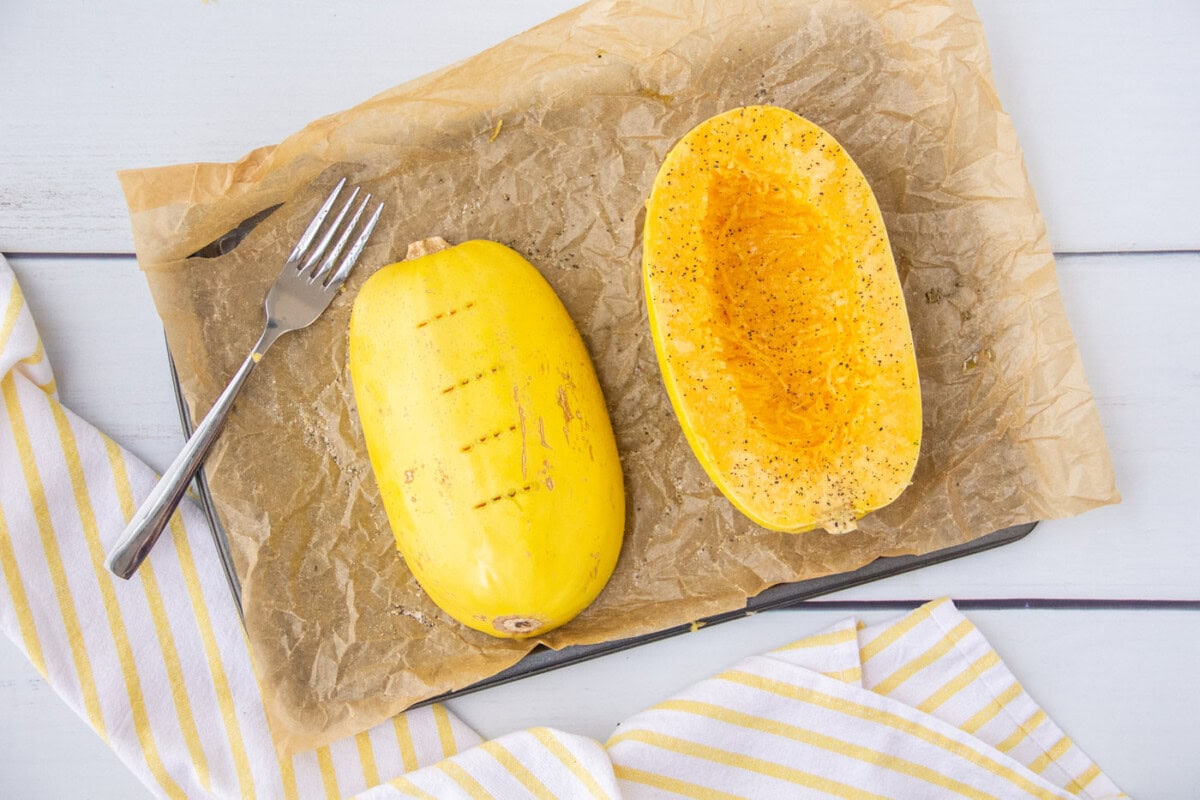 piercing spaghetti squash with a fork
