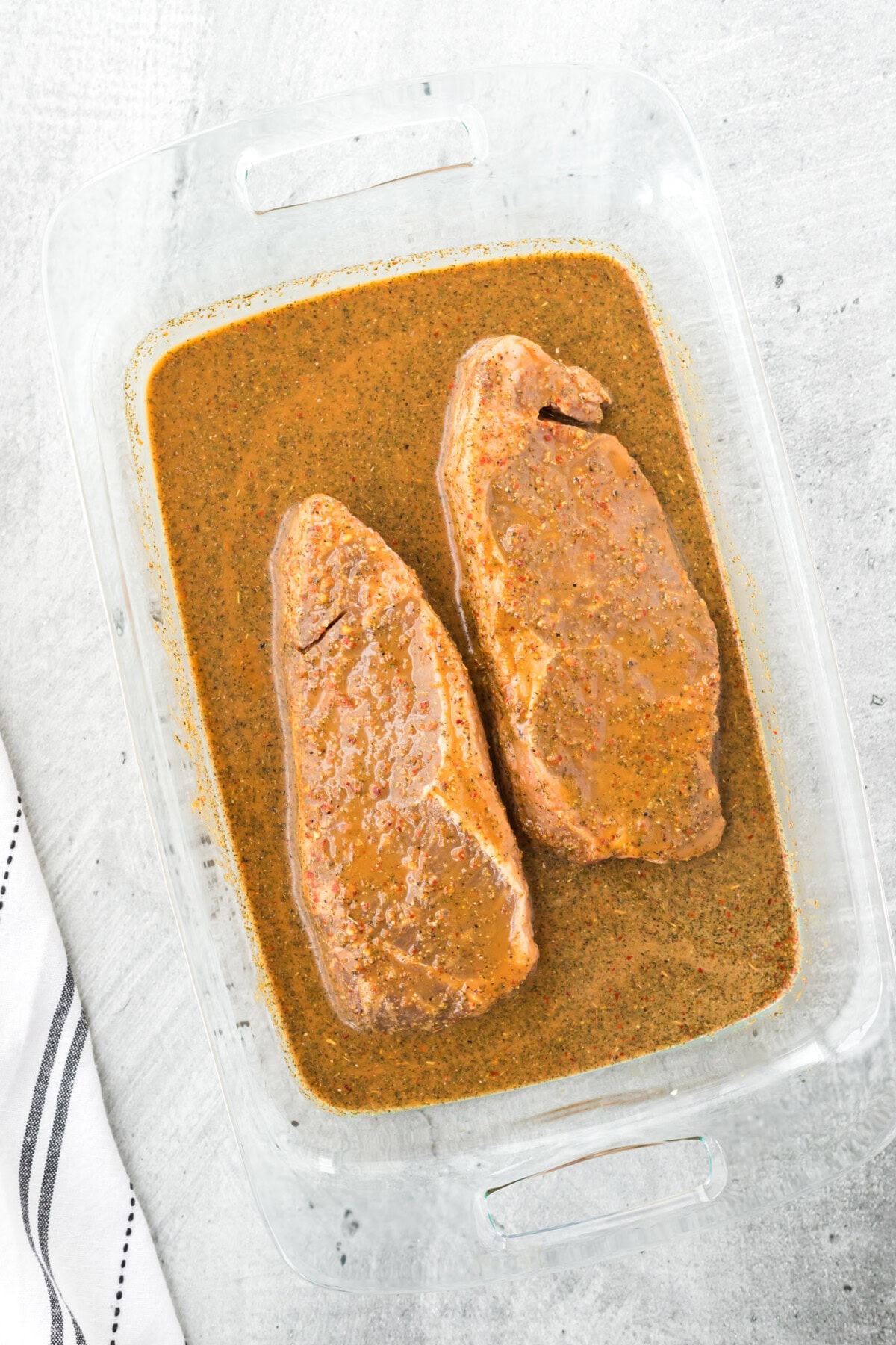 Steak Marinating in a pan