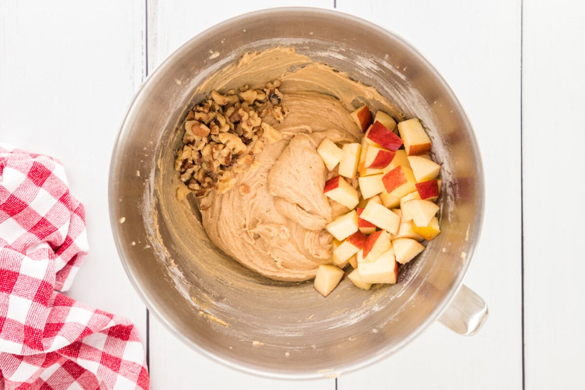 chopped walnuts and apples added to bread batter