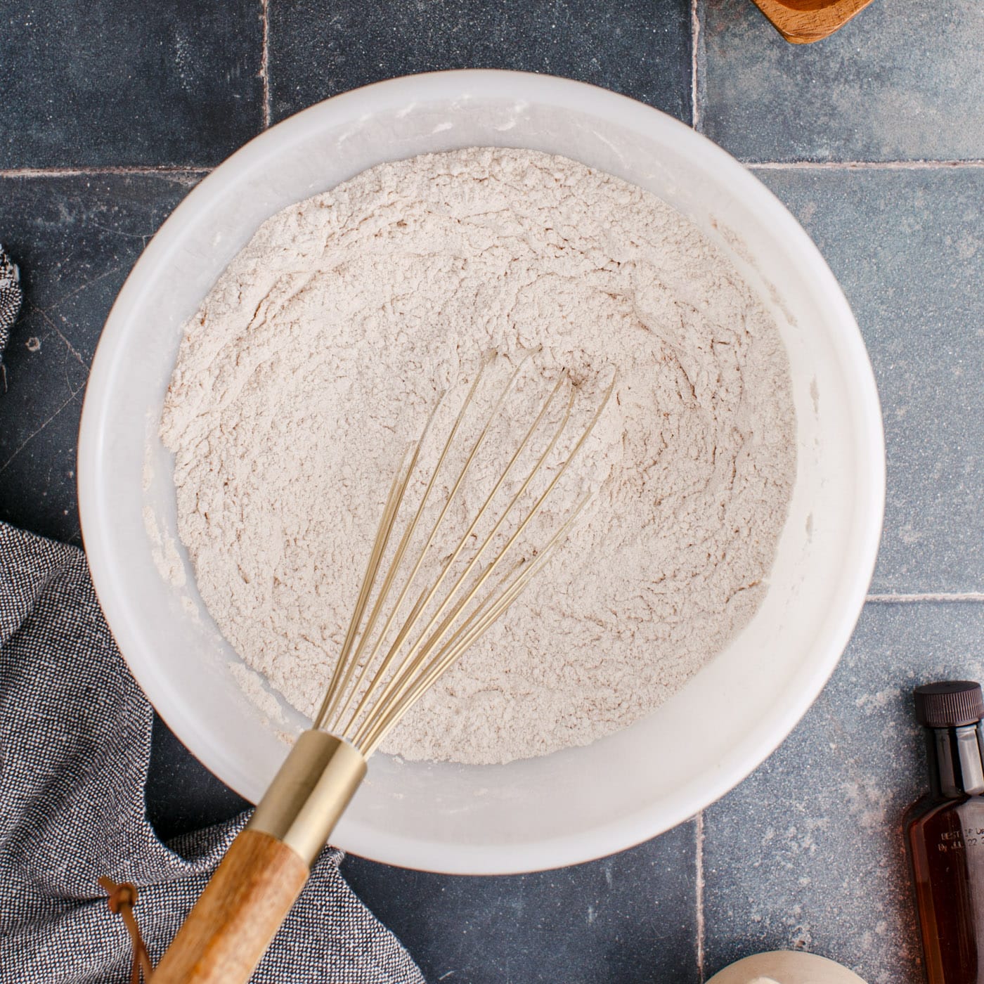 flour, cinnamon, and salt in a bowl with a whisk