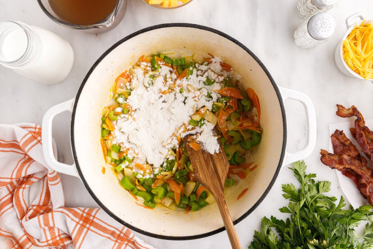 stirring flour into sauteed vegetables