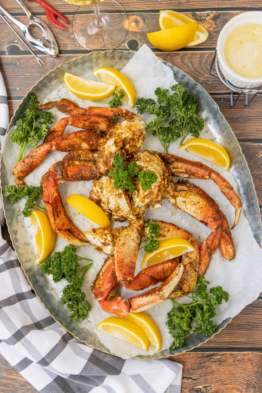 Dungeness Crab Legs on a platter with lemon