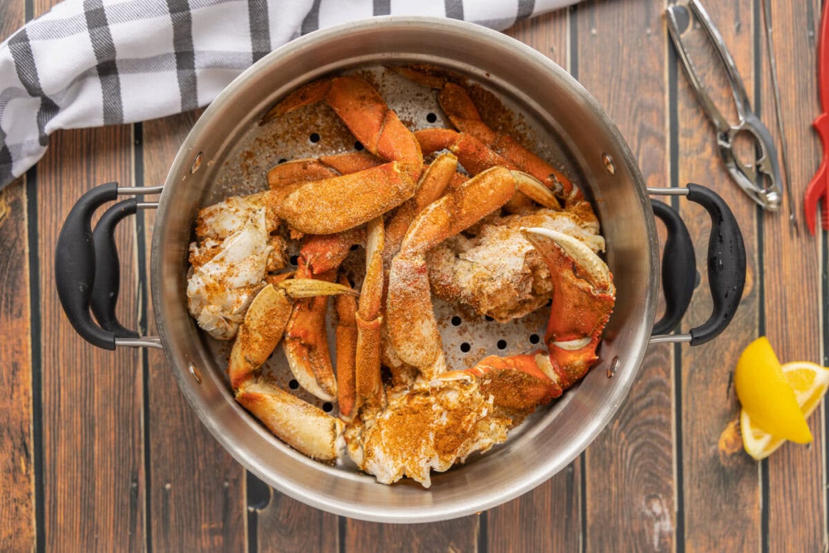 dungeness crab legs in a steam pot