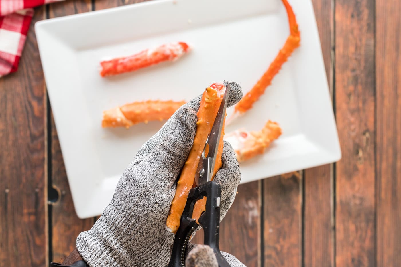 using kitchean shears to cut open crab legs