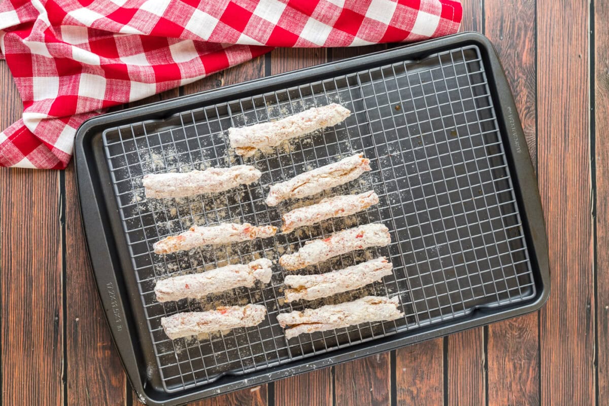 battered crab legs on a wire rack