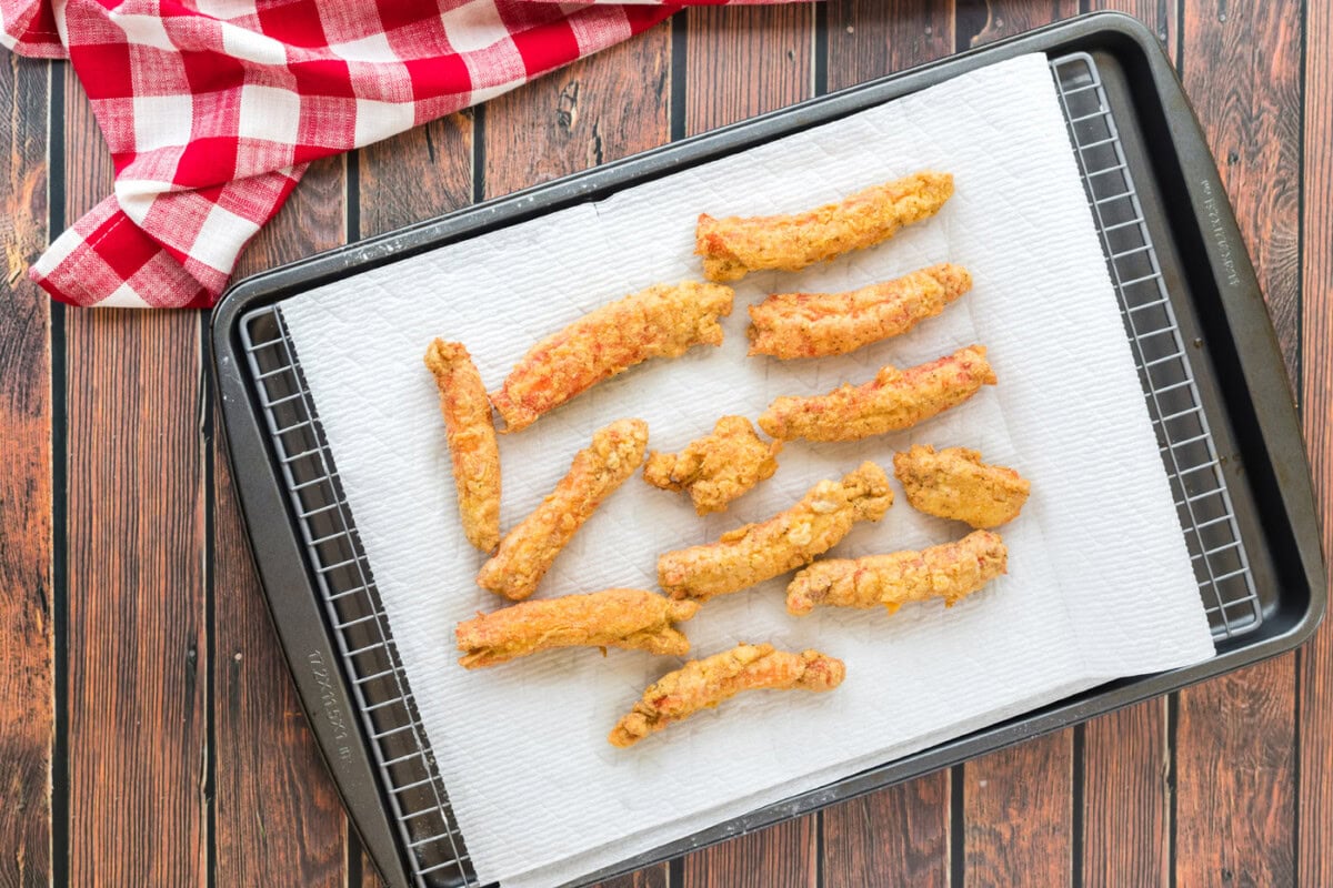 fried crab legs on a paper towel