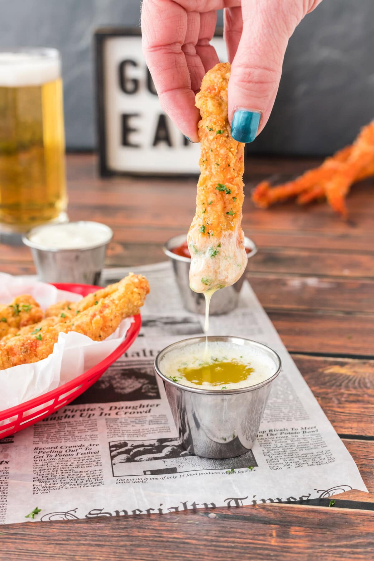 dipping Fried Crab Leg in butter