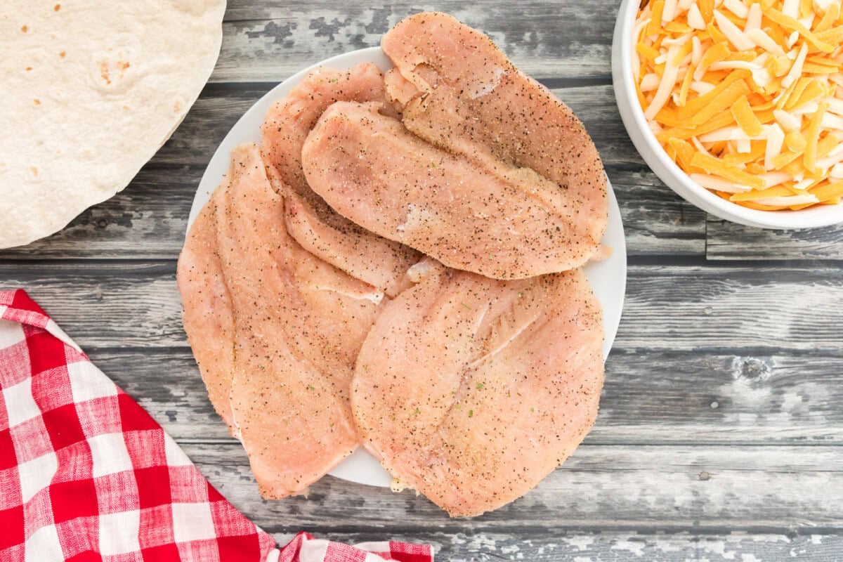 seasoned chicken breasts on a plate
