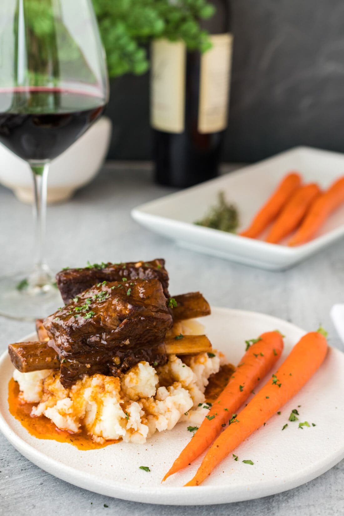 Instant Pot Beef Short Ribs on plate with potatoes