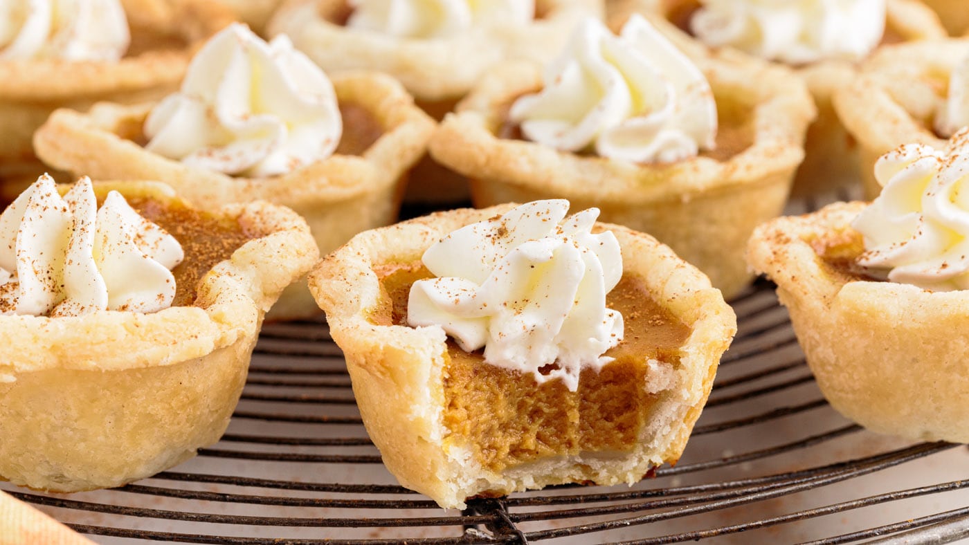 These adorable mini pumpkin pies begin with a flakey homemade crust that’s filled with a rich pumpki