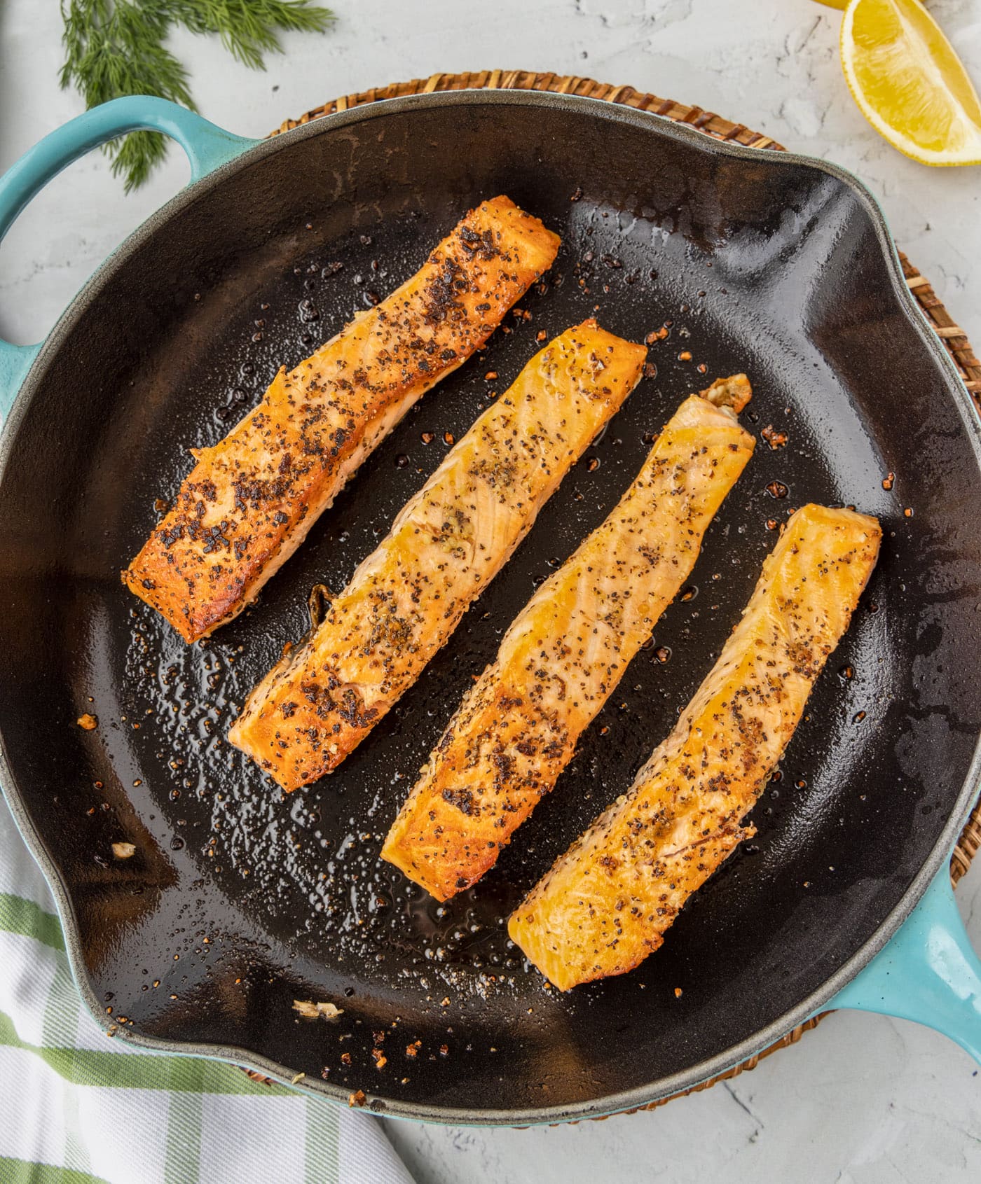 salmon pan fried in a skillet