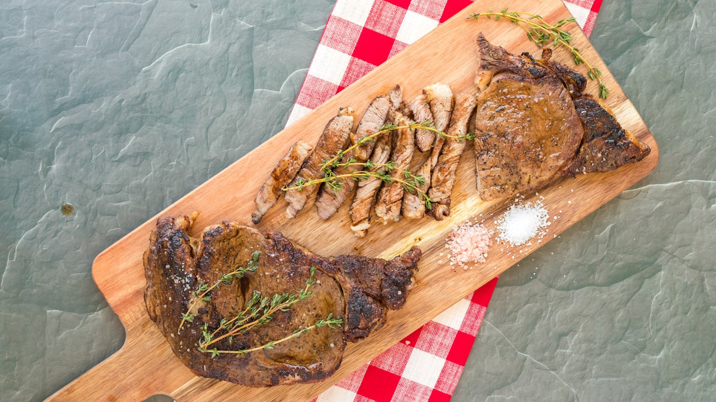 With this reverse sear ribeye, you'll start by slow baking the steak in the oven, then removing it t