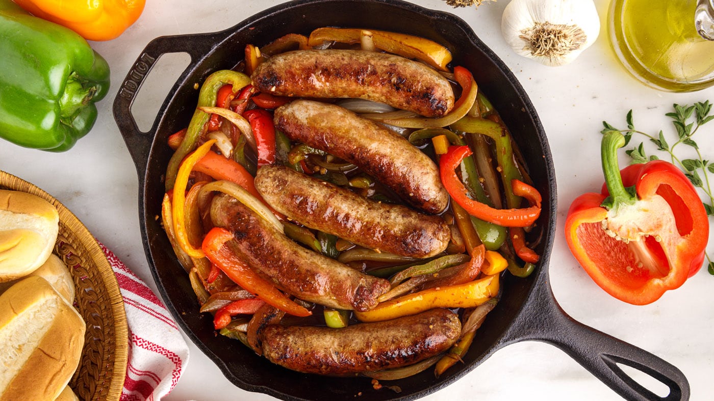 This skillet-style sausage and peppers recipe is seared with colorful bell peppers and onions and sa