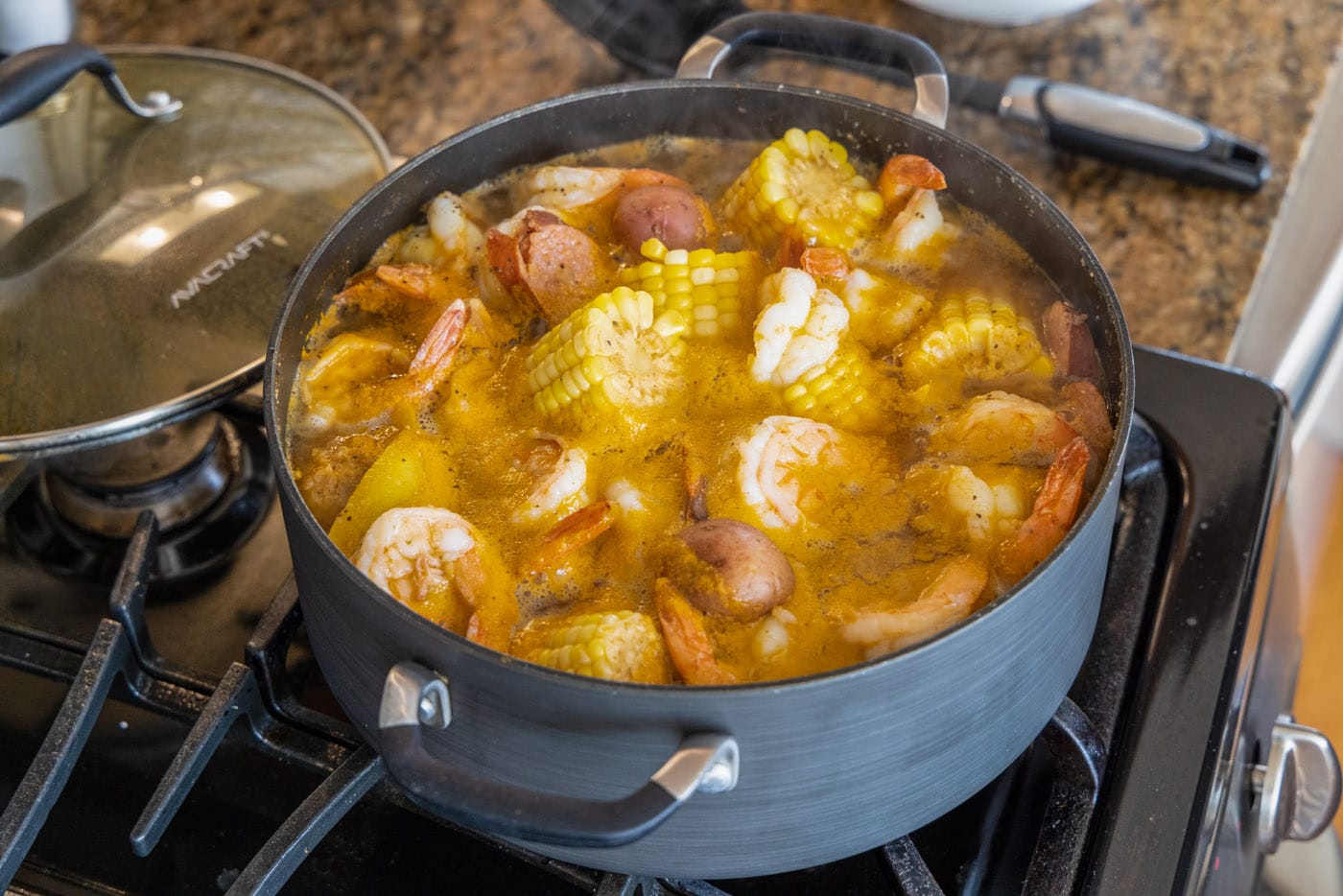 cooked shrimp boil in a pot