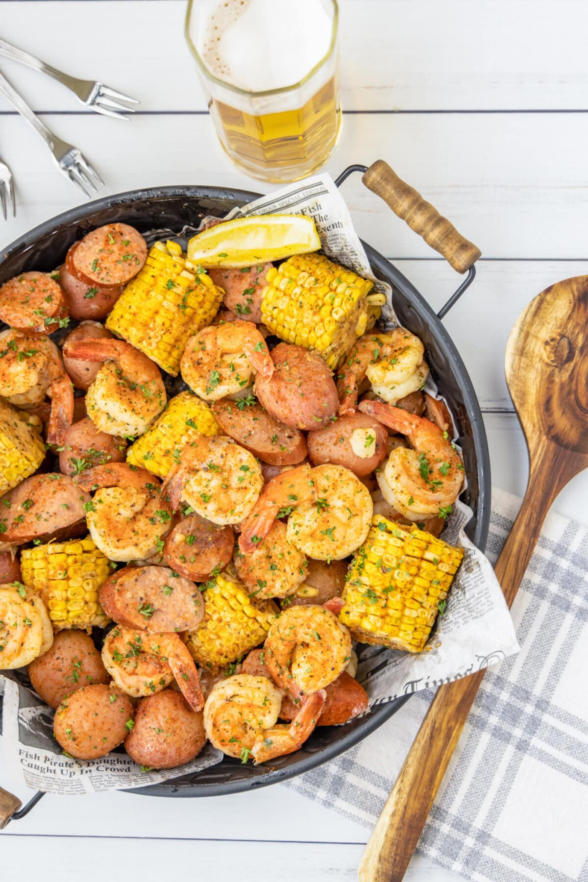 Shrimp Boil with beer and a spoon