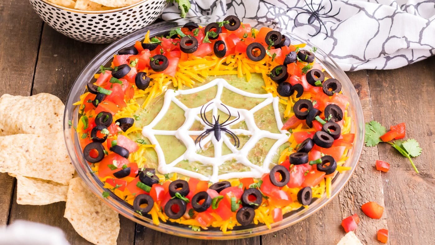 Spider web taco dip is really easy to make, uses a handful of simple ingredients