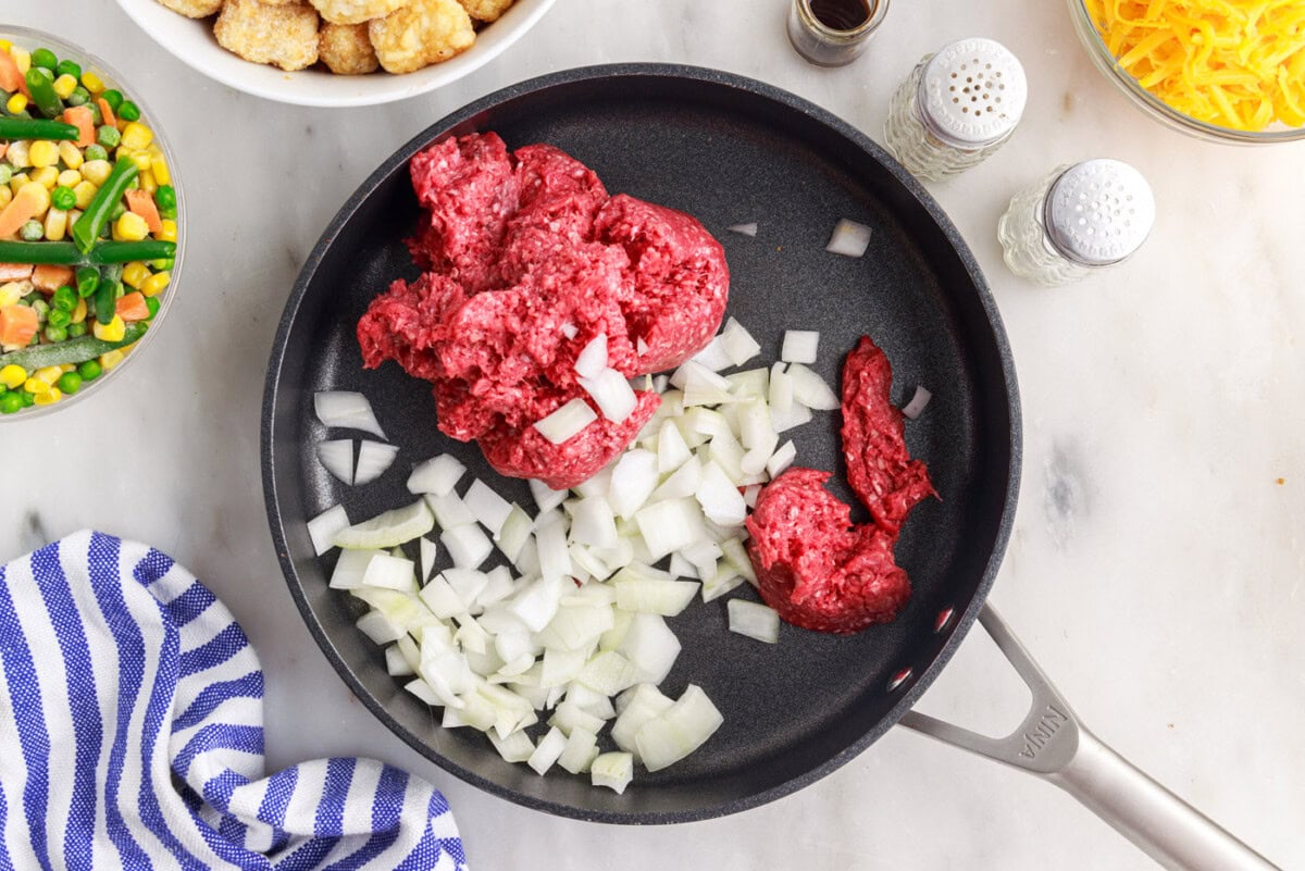 ground beef and onion in a skillet