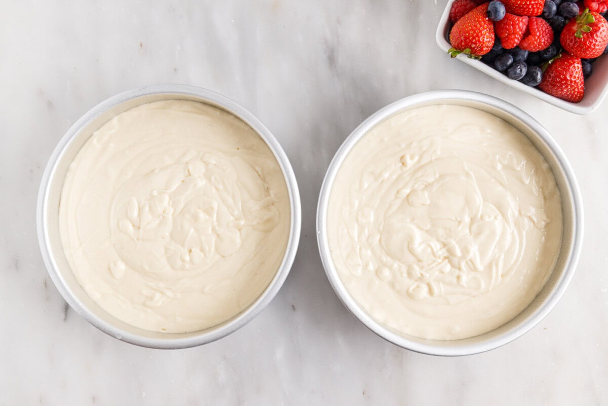 cake batter in round cake pans