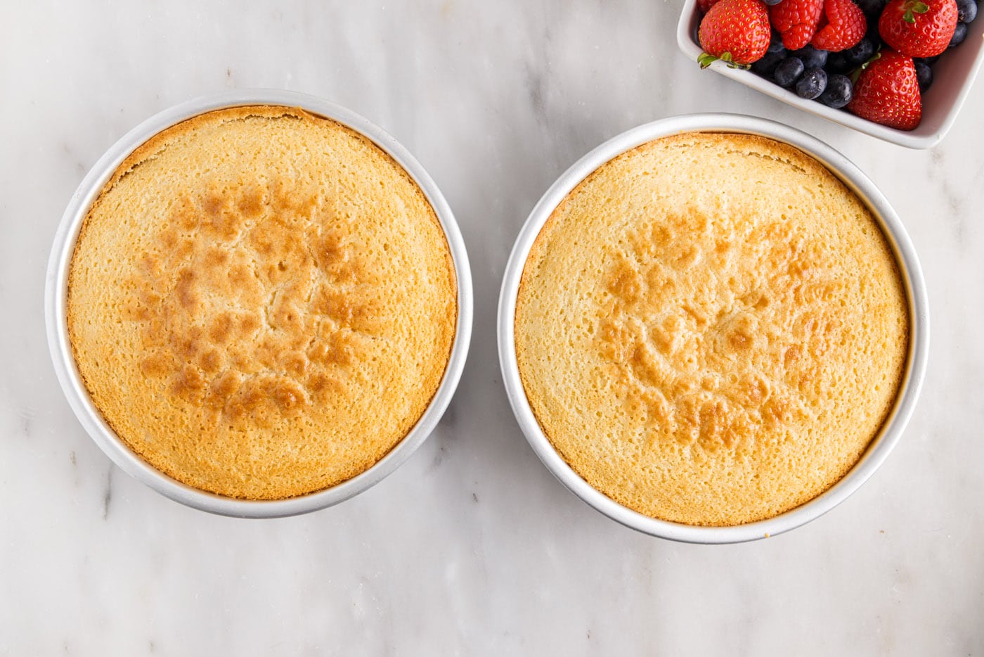 two cakes baked in a pan