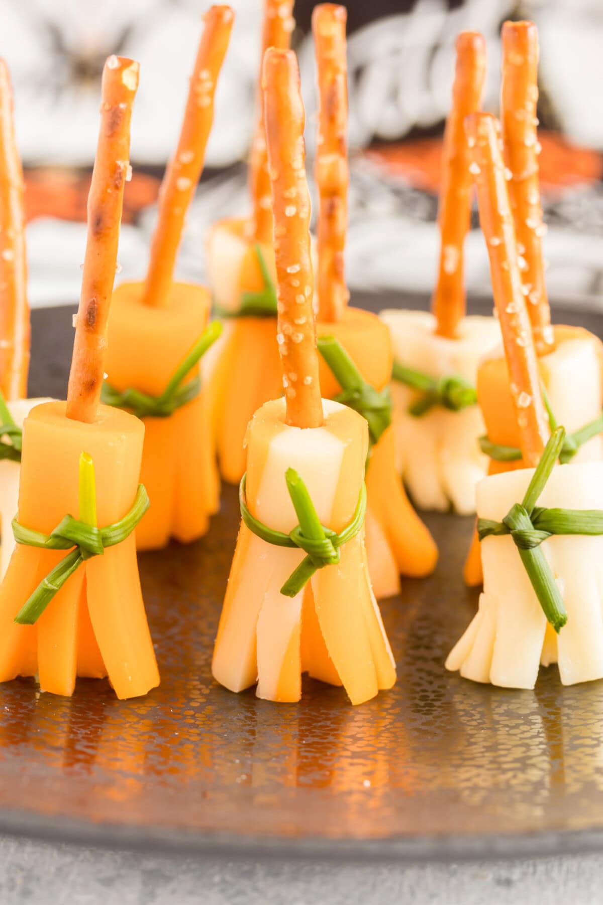 pretzel broomsticks on a tray