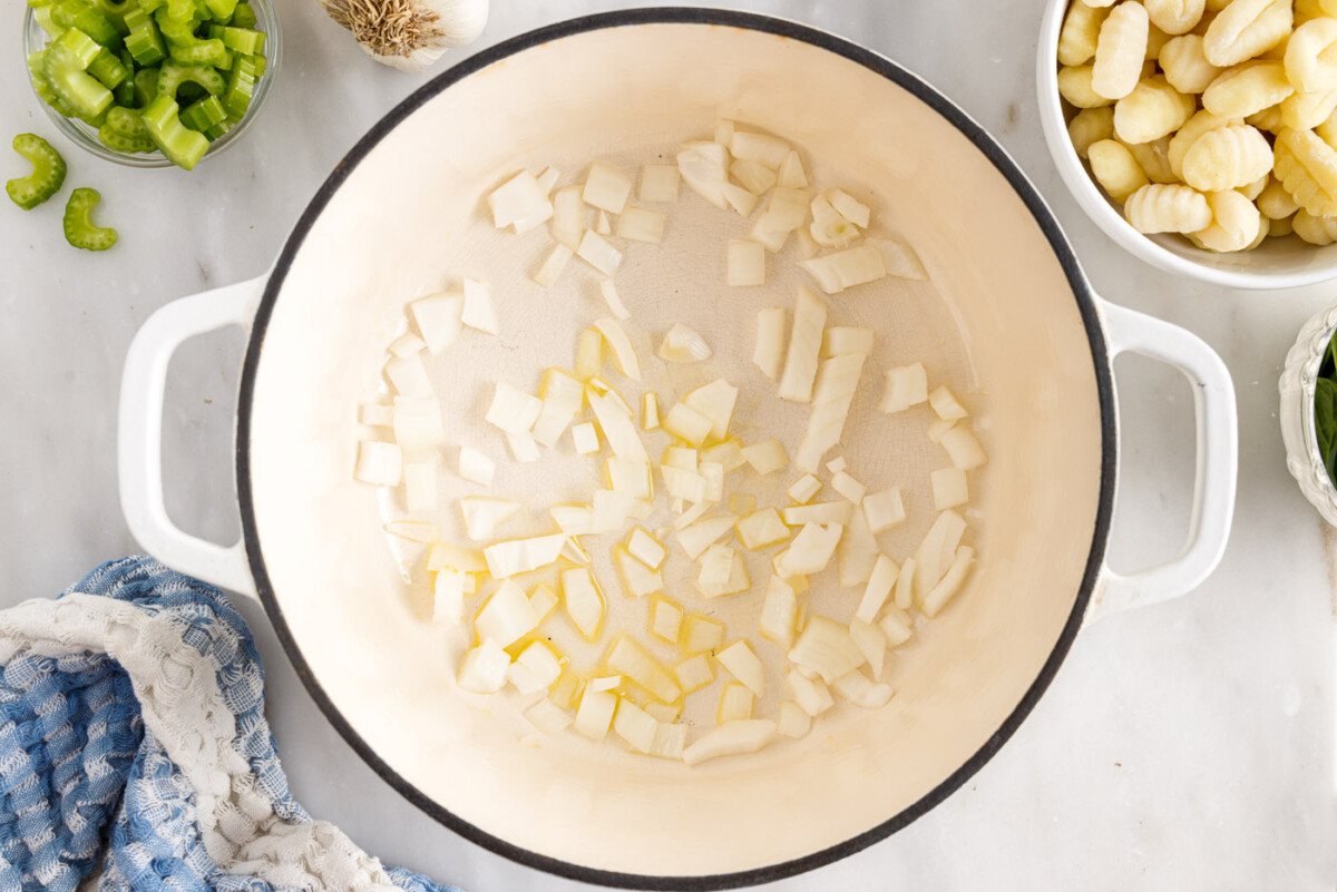 sauteeing onion in a pot
