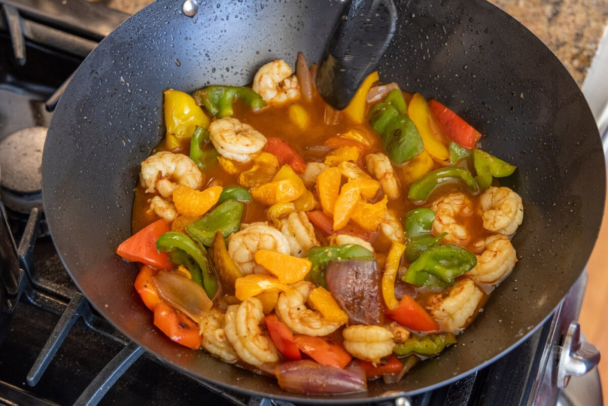 citrus pepper shrimp in a wok