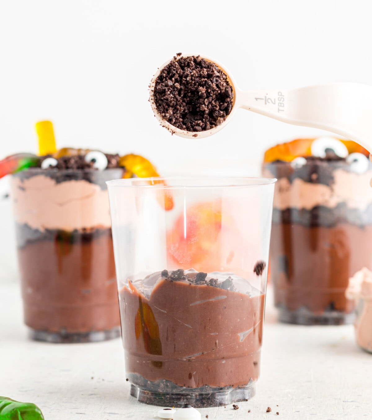 adding oreo dirt layer to chocolate pudding