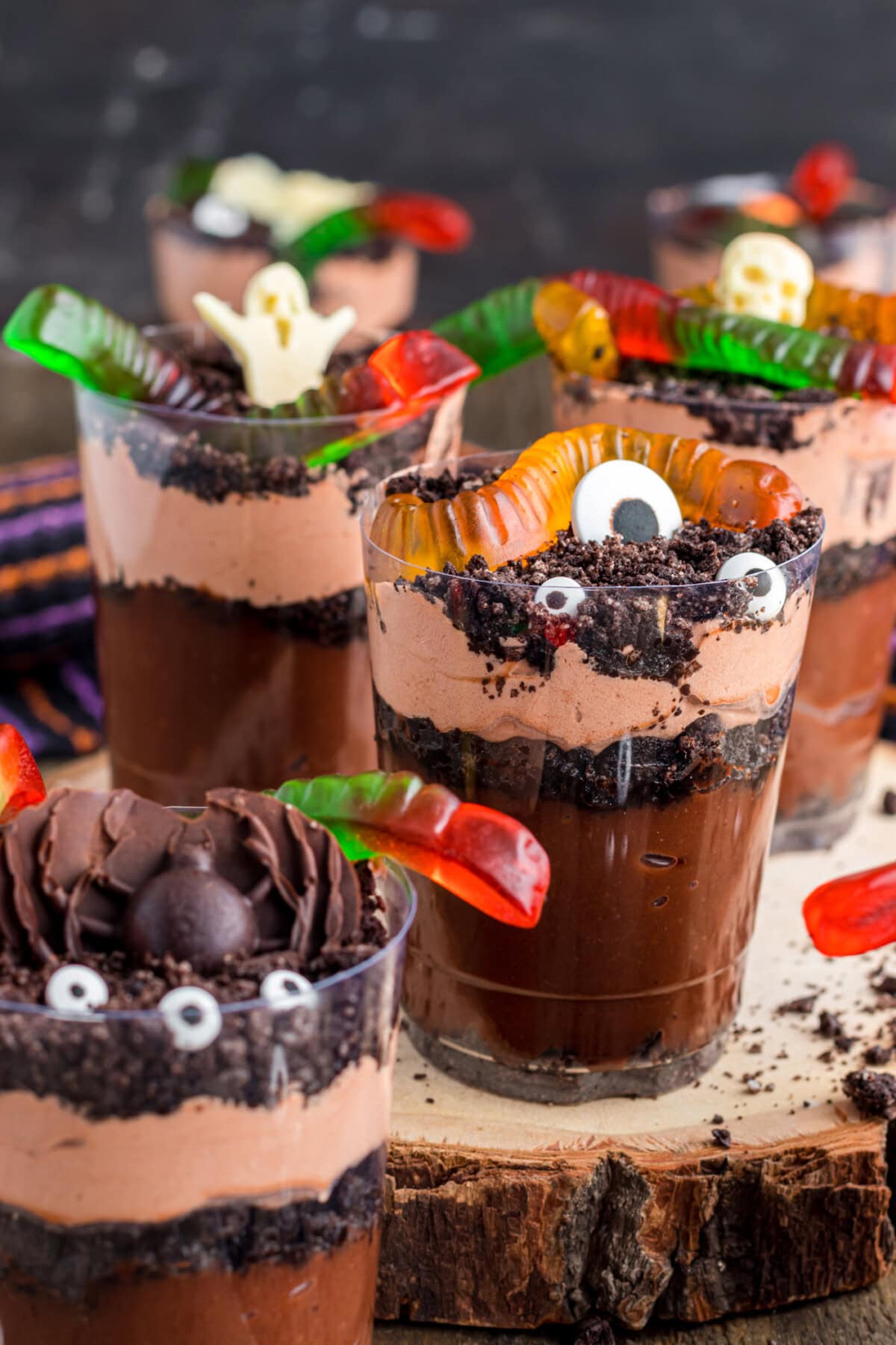 Halloween Dirt Cups on a wood board