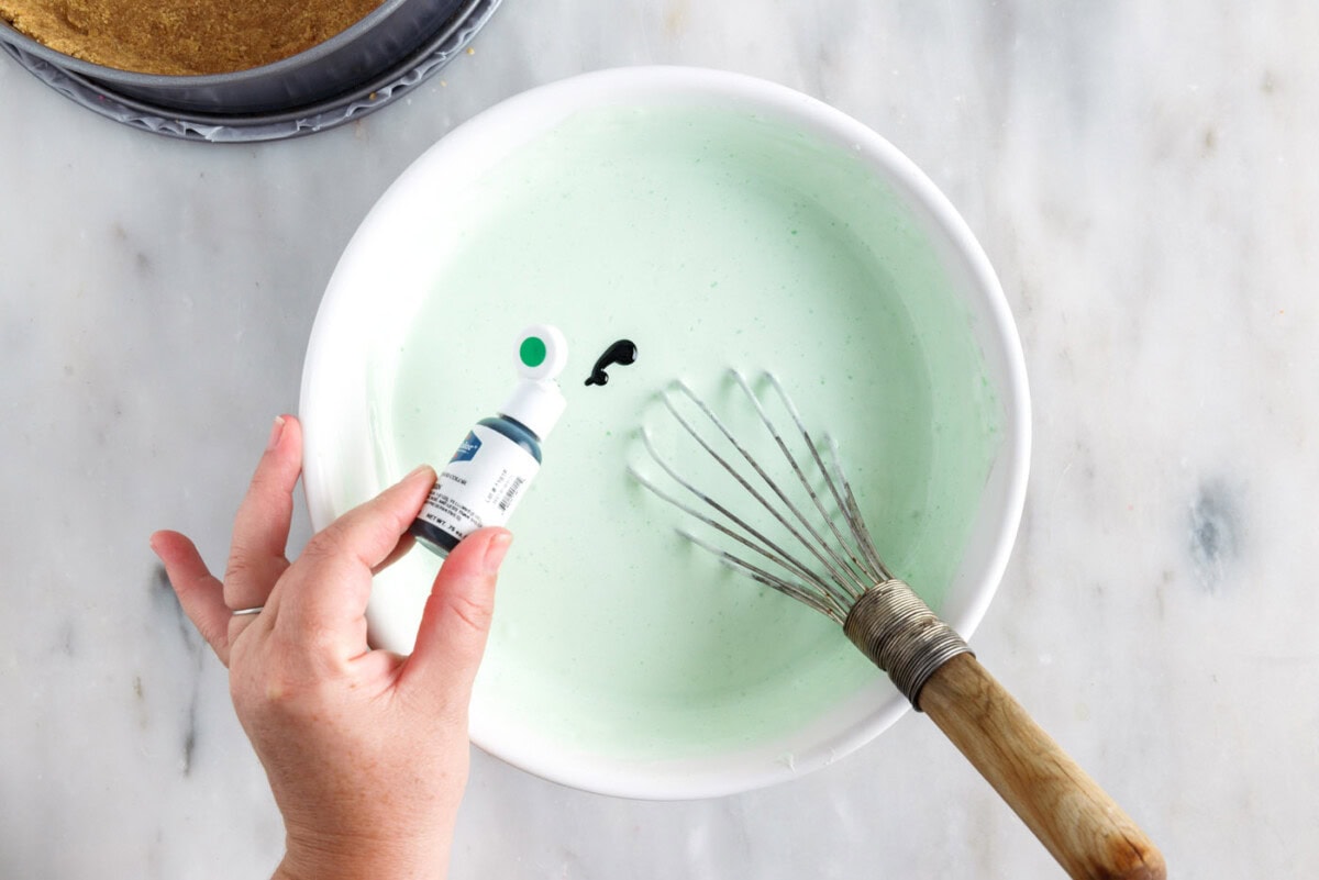 whisking lime jello with gel food color