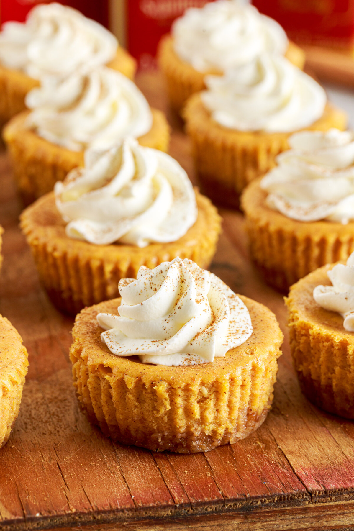 Mini Pumpkin Cheesecakes on cutting board